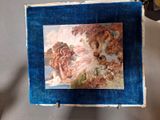 a picture of a painting hanging on a wall