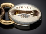 an image of a close up of a metal object with a name on it