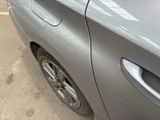 a close up of a car ' s door handle and door handle