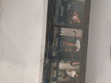 a picture of a group of people standing in a room