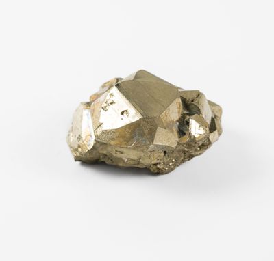 a close up of a piece of metal on a white surface