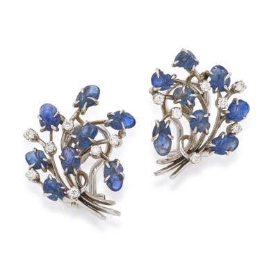 a pair of sapphire and diamond earrings