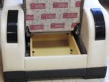 a chair that has a box in the middle of it
