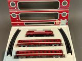 a close up of a train set in a box on a table