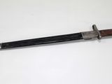 a knife that is laying on top of a table