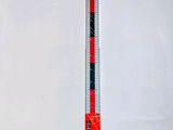 a close up of a ruler on a white surface