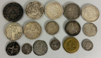 an image of a group of coins sitting on top of a white surface