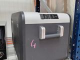 an image of a cooler sitting on a shelf in a warehouse