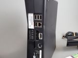 a computer on a table with a keyboard and a mouse
