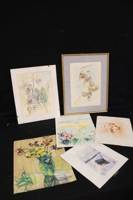 several cards and a picture of a cat are on a table