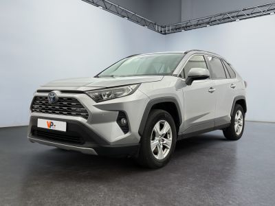 a grey toyota rav parked in a garage