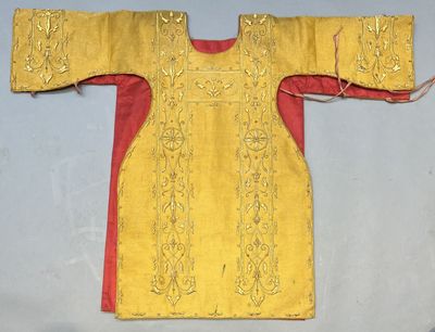 an image of a yellow and red dress on a white surface