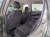 a car that has two seats in the back of it