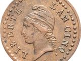 a close up of a coin with a woman ' s head on it