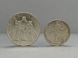 an image of a coin with a woman on it next to another coin