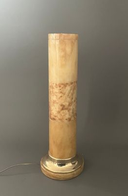 an image of a table lamp with a marble column on it