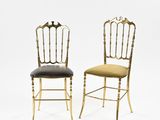 pair of gilded chairs with upholstered seats