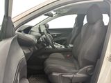 the interior of a car with the door open showing the driver ' s seat area