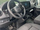 the interior of a car with a steering wheel and dashboard controls