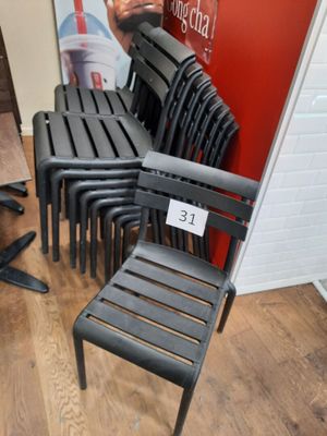 a lot of chairs that are sitting in a room