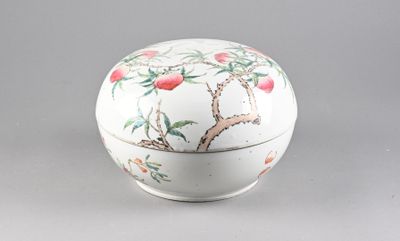 a white bowl with a design on it on a gray surface