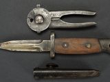 three different types of knives are shown on a black surface
