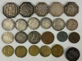 an image of a collection of old coins on a white surface