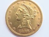 une pièce d'or ornée d'une tête de femme