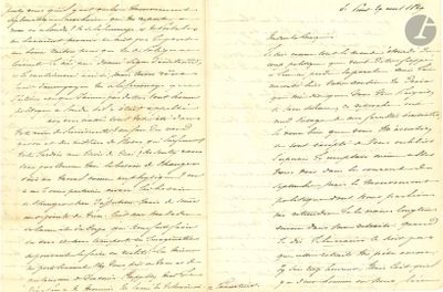 an old document with writing on it is open to a page