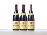 three bottles of wine sitting on top of a table