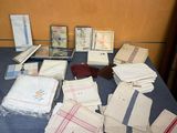 a table with a bunch of books and papers on it