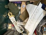 a picture of a trash can filled with various items