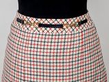 a close up of a skirt with a belt on a mannequin mannequin mannequin mannequin mannequin mannequin mann