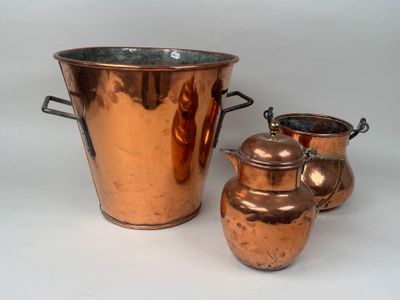 two copper pots and a copper vase on a white background