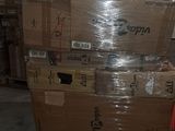 many boxes stacked on top of each other in a warehouse