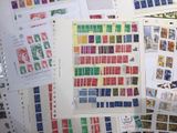 many different types of stamps on a table