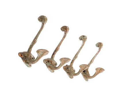three metal hooks with birds on them on a white background