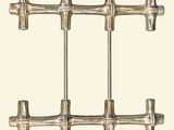 a picture of a metal fence made of bamboo sticks
