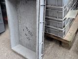 a stack of crates sitting on top of a pallet