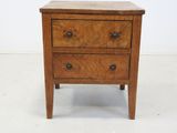 an image of a small wooden table with three drawers