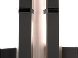 two speakers that are sitting on a table