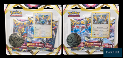 two packs of pokemon trading cards with a coin in each of them