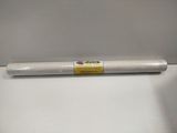 a roll of white paper sitting on top of a white table