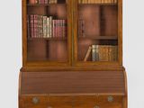 an image of a small desk with a book case