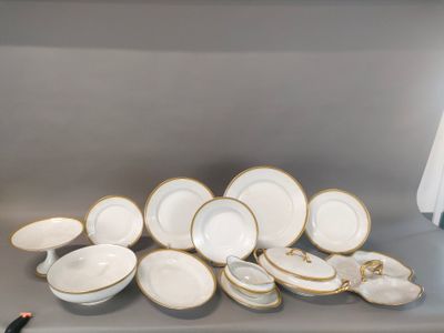a lot of white and gold plates and bowls on a shelf