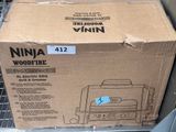 a cardboard box that is sitting on a metal shelf