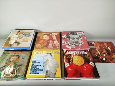 a lot of books that are sitting on a table