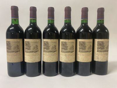 six bottles of wine are lined up in a row