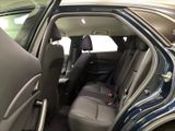 a view of the inside of a car from the driver ' s seat