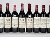 six bouteilles de vin rouge alignées